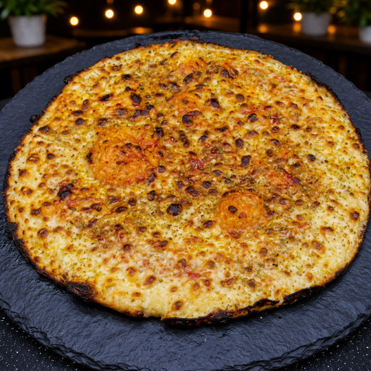 MARGHERITA CLASSIQUE : Sauce tomate du chef, mozzarella 100%, origan.